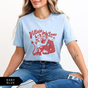 Comfort Colors tee in Baby Blue featuring vintage style graphic of a devilish couple embracing with text Villain Lover