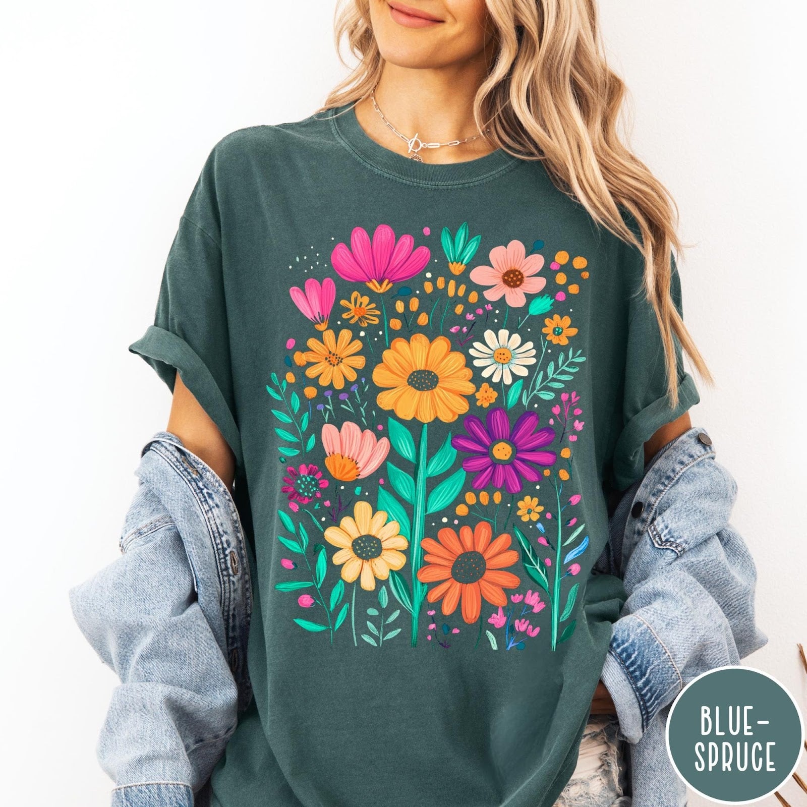 Comfort Colors tee in Blue Spruce featuring boho style floral graphic with vibrant orange, pink, and purple flowers