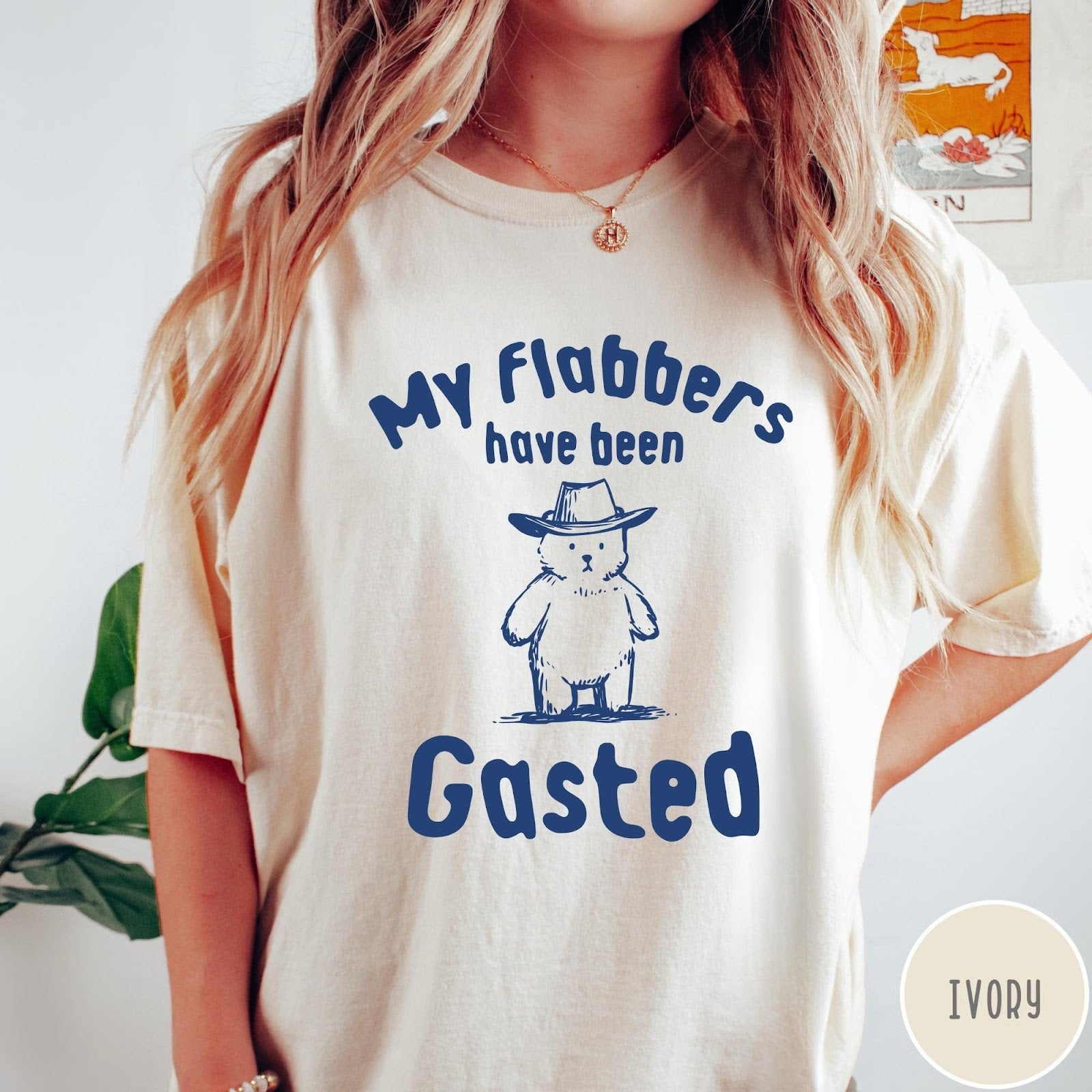 Comfort Colors tee in Ivory featuring illustrated style bear wearing a cowboy hat and text graphic
