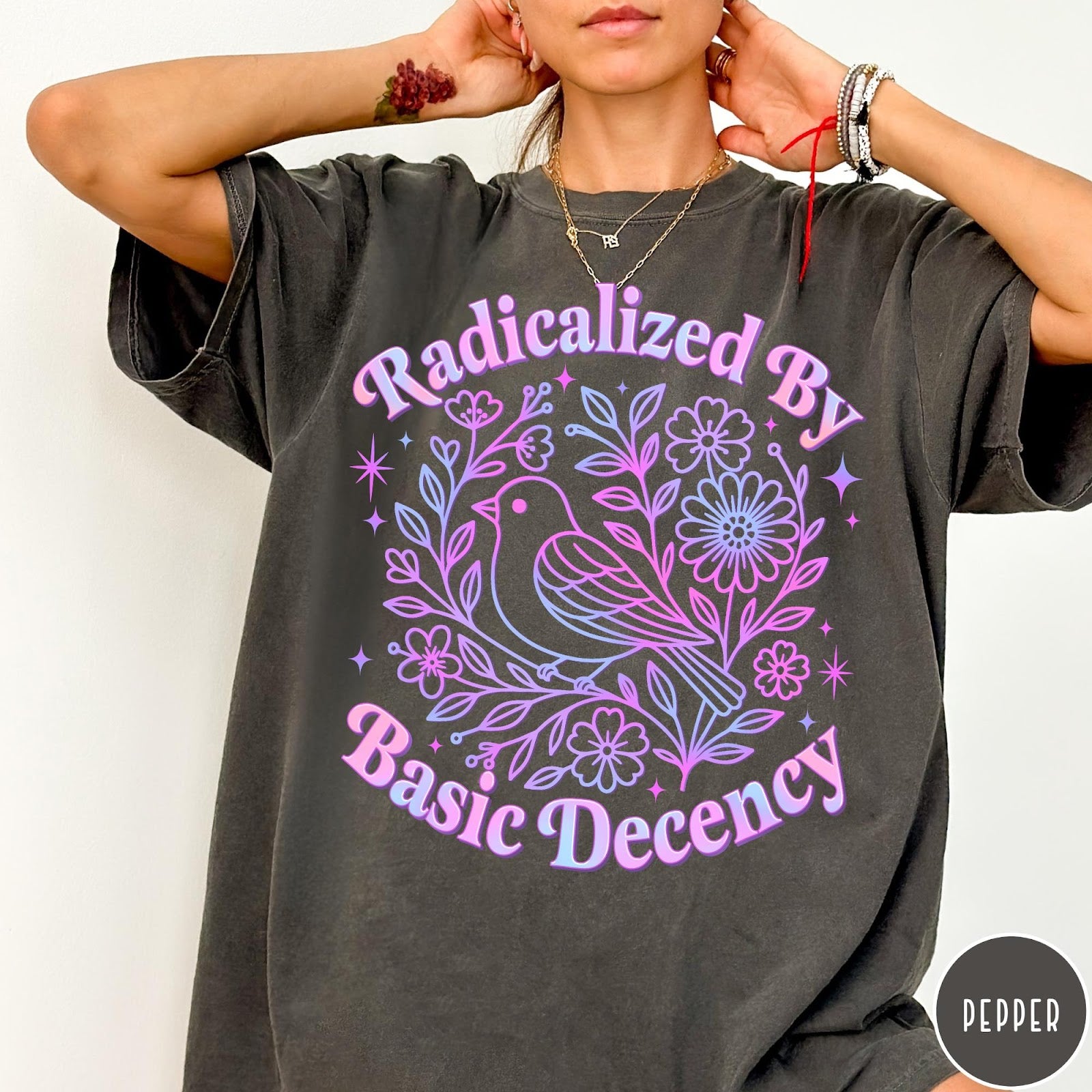 Comfort Colors tee in Pepper featuring floral design style with a bird and flowers graphic print