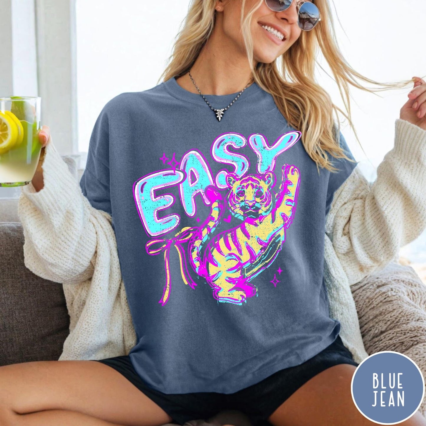 Comfort Colors tee in Blue Jean featuring retro graphic style with a tiger and the word Easy