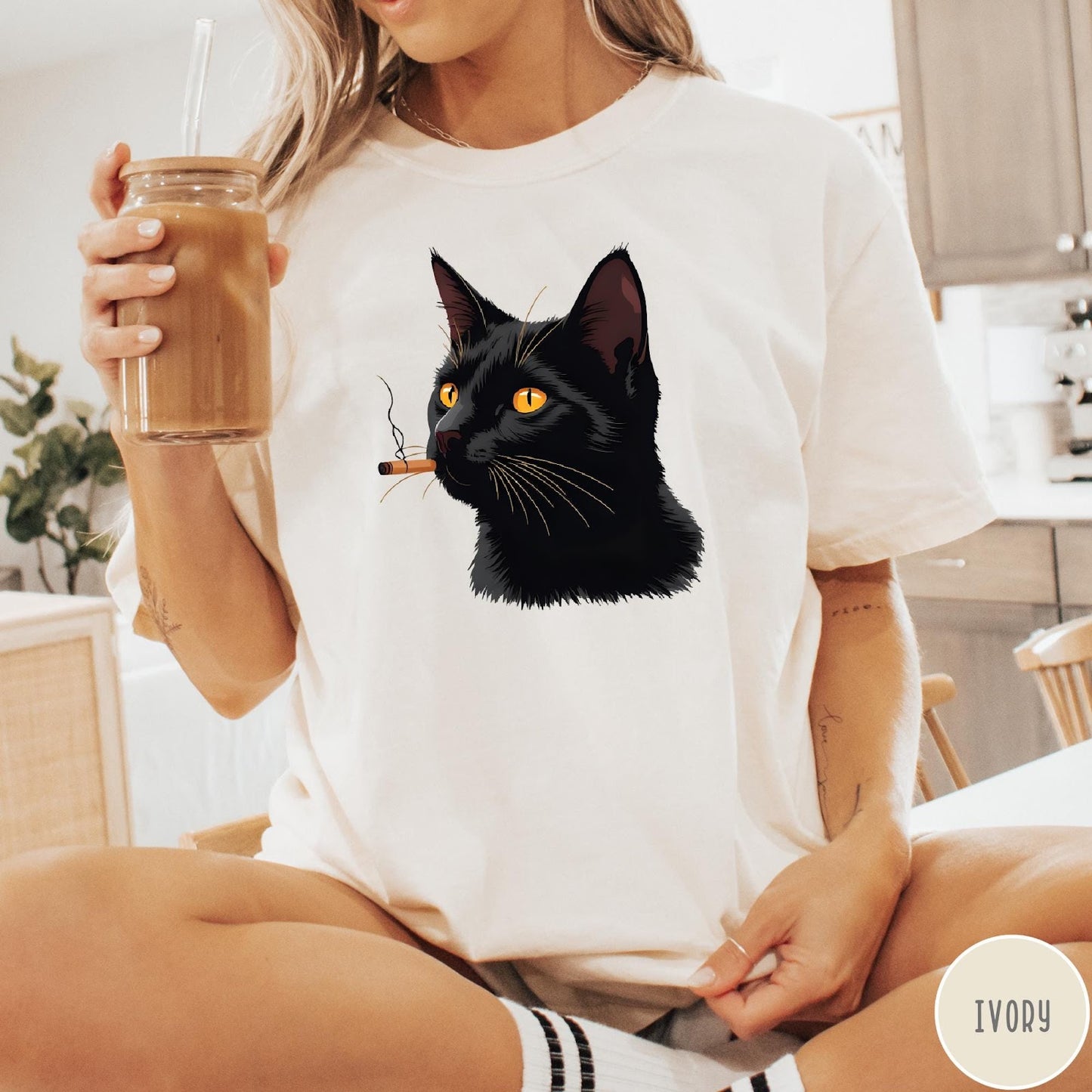 Comfort Colors tee in Ivory featuring graphic illustration of a black cat smoking a cigarette.