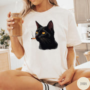 Comfort Colors tee in Ivory featuring graphic illustration of a black cat smoking a cigarette.