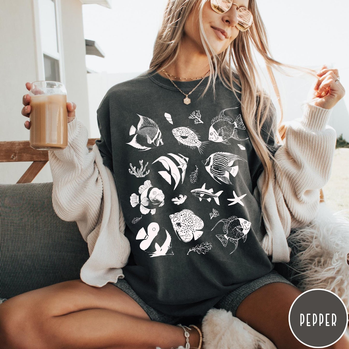 Comfort Colors tee in Pepper featuring coastal style graphic with various tropical fish and ocean life illustrations