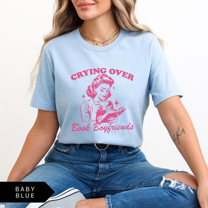 Comfort Colors tee in Baby Blue featuring retro style graphic of a woman crying while reading a book