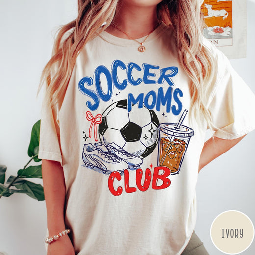 Comfort Colors tee in Ivory featuring soccer mom lifestyle graphic with soccer ball, cleats, and iced coffee