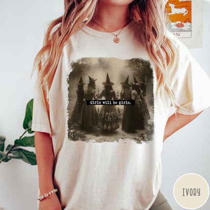 Comfort Colors tee in Ivory featuring vintage style graphic of five witches standing in a circle together