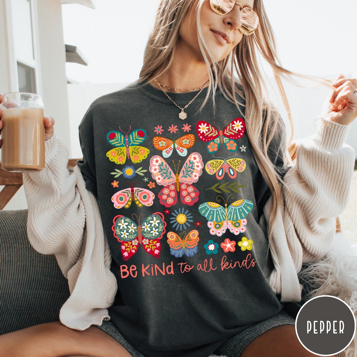 Comfort Colors tee in Pepper featuring colorful butterfly and floral graphic with Be Kind to all kinds text