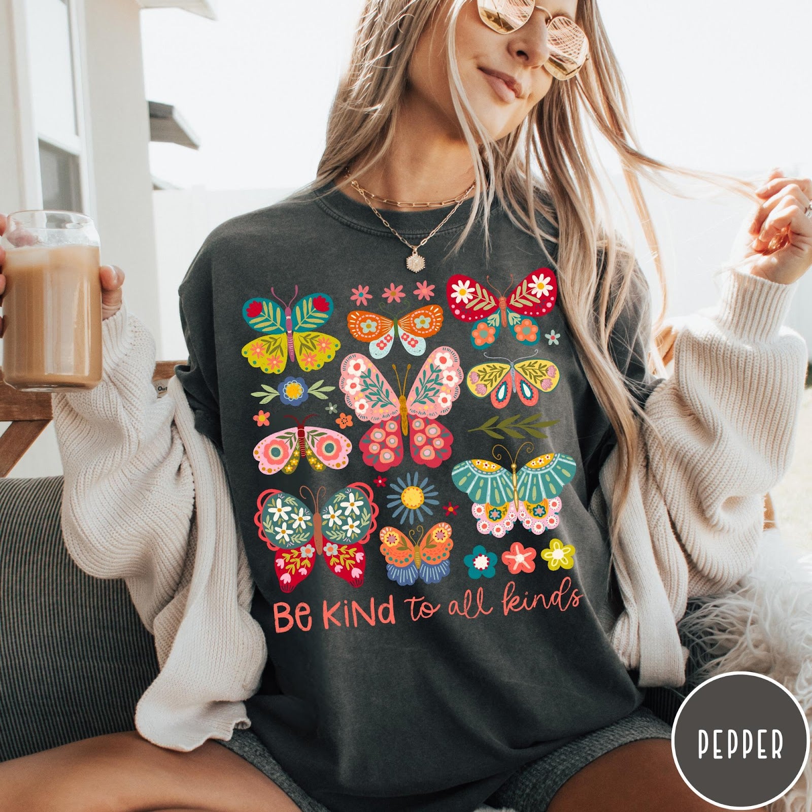 Comfort Colors tee in Pepper featuring colorful butterfly and floral graphic with Be Kind to all kinds text
