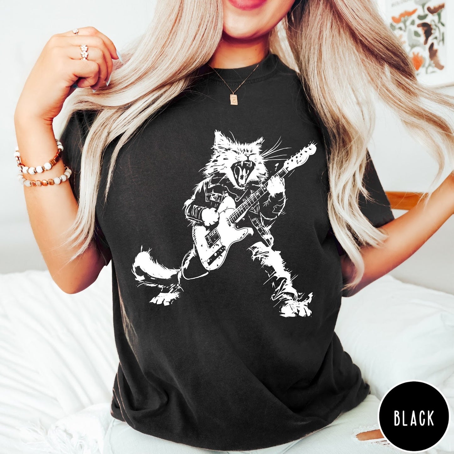 Comfort Colors tee in Black featuring rock music style graphic of a cat playing an electric guitar