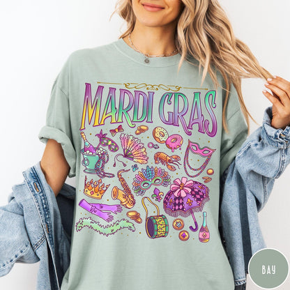 Comfort Colors tee in Bay featuring vintage style Mardi Gras celebration icons including masks, beads, and saxophone