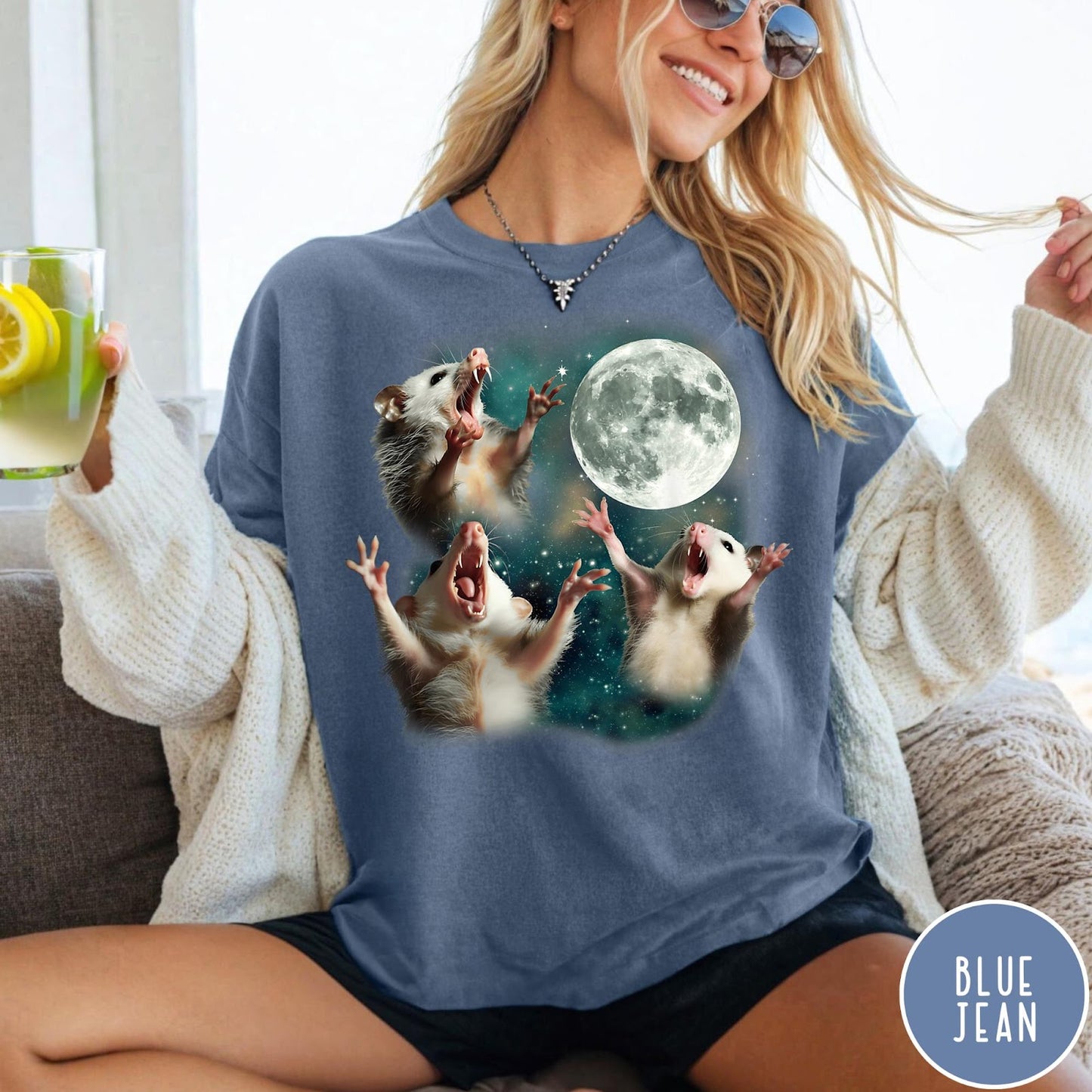 Comfort Colors tee in Blue Jean featuring vintage graphic style with three screaming possums reaching for the moon