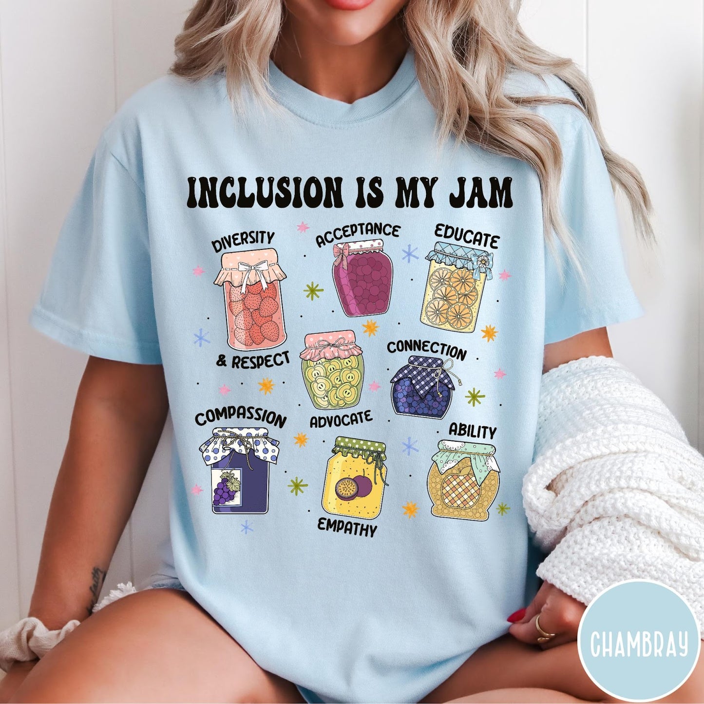 Comfort Colors tee in Chambray featuring retro style graphic with jam jars labeled with inclusion and advocacy terms