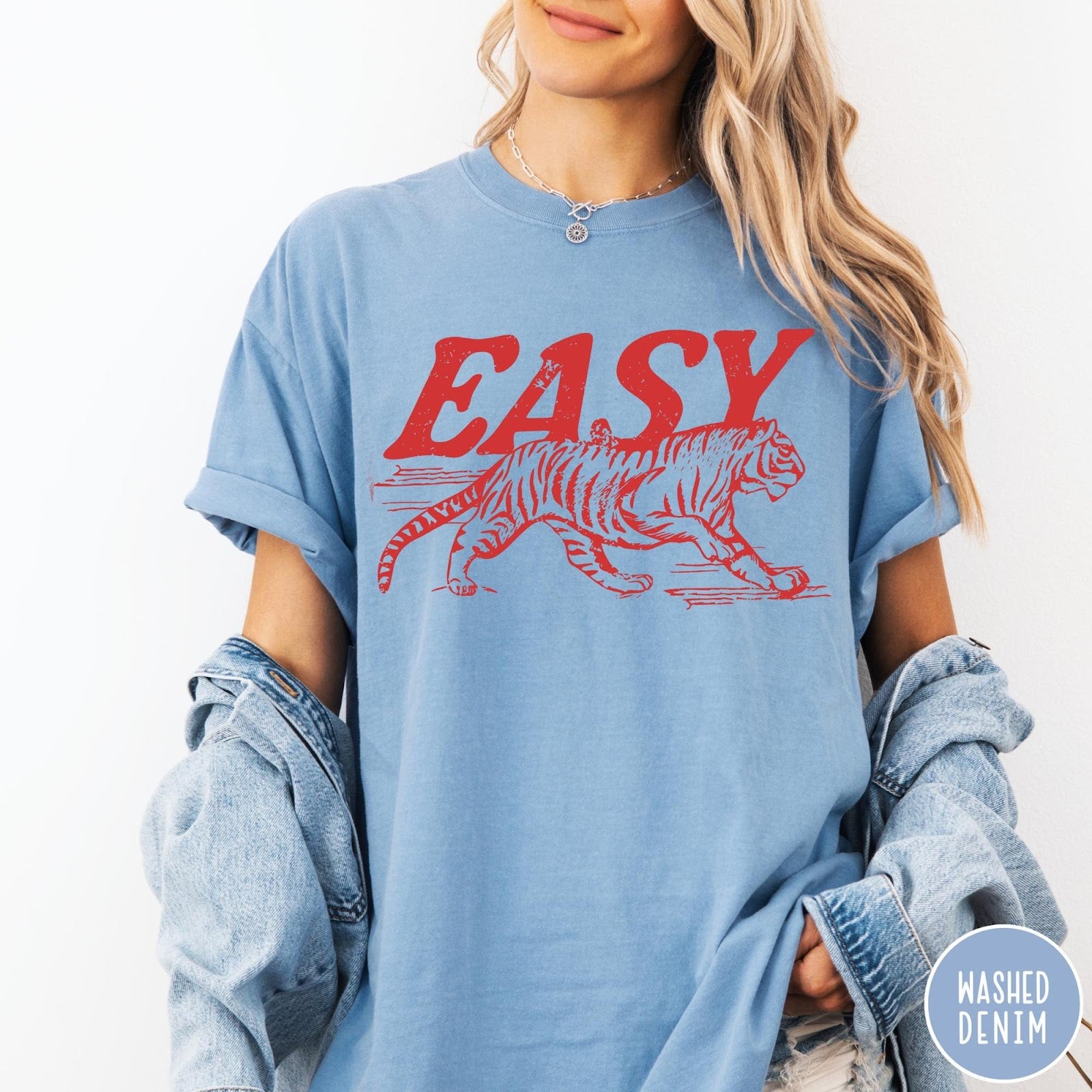 Comfort Colors tee in Washed Denim featuring vintage style graphic of a walking tiger and text Easy