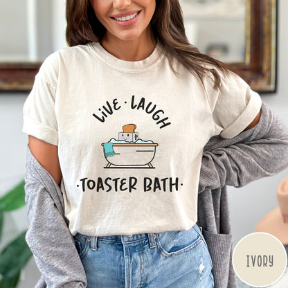 Comfort Colors tee in Ivory featuring cute graphic style of a smiling toaster sitting in a bathtub