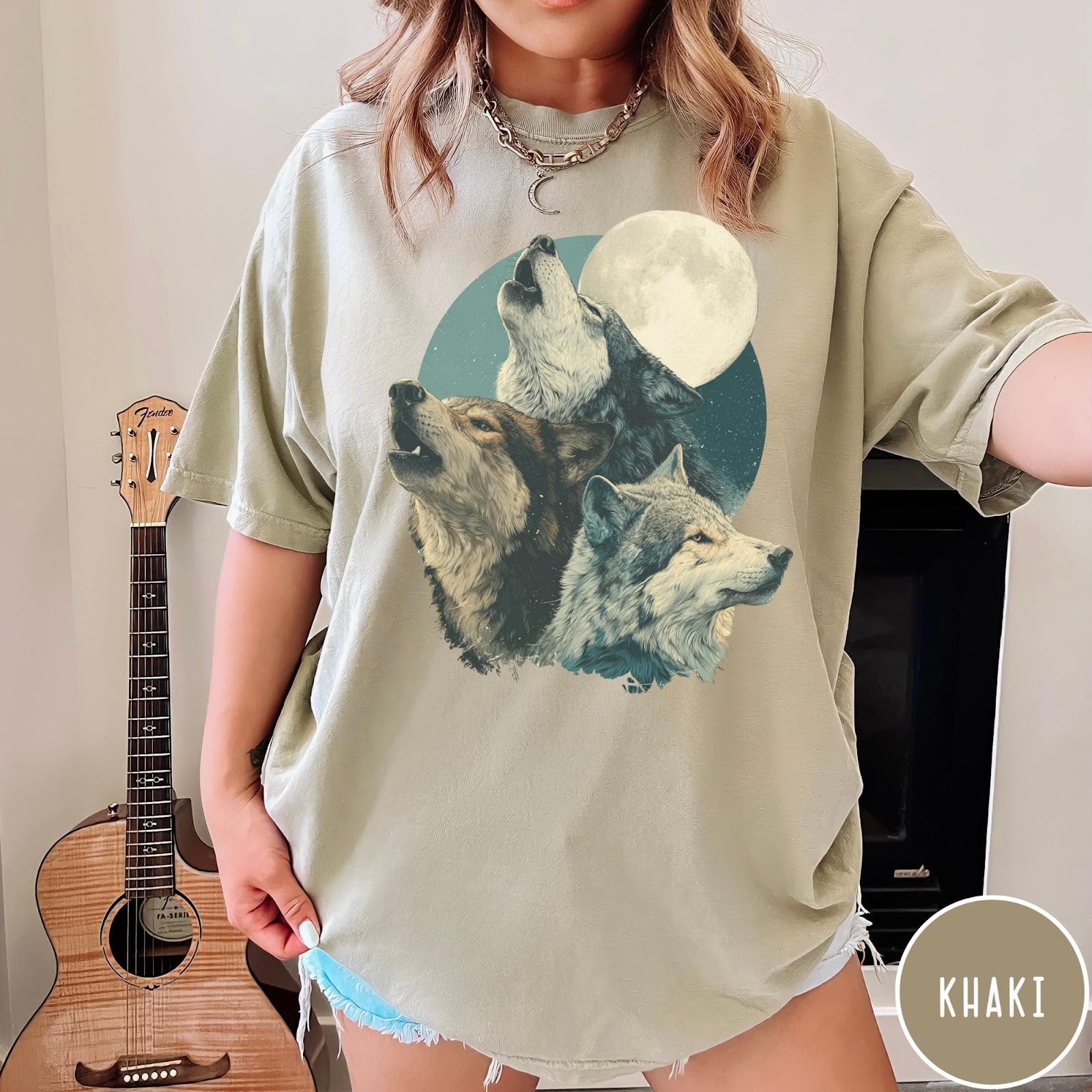 Comfort Colors tee in Khaki featuring vintage style graphic of three wolves howling at a full moon