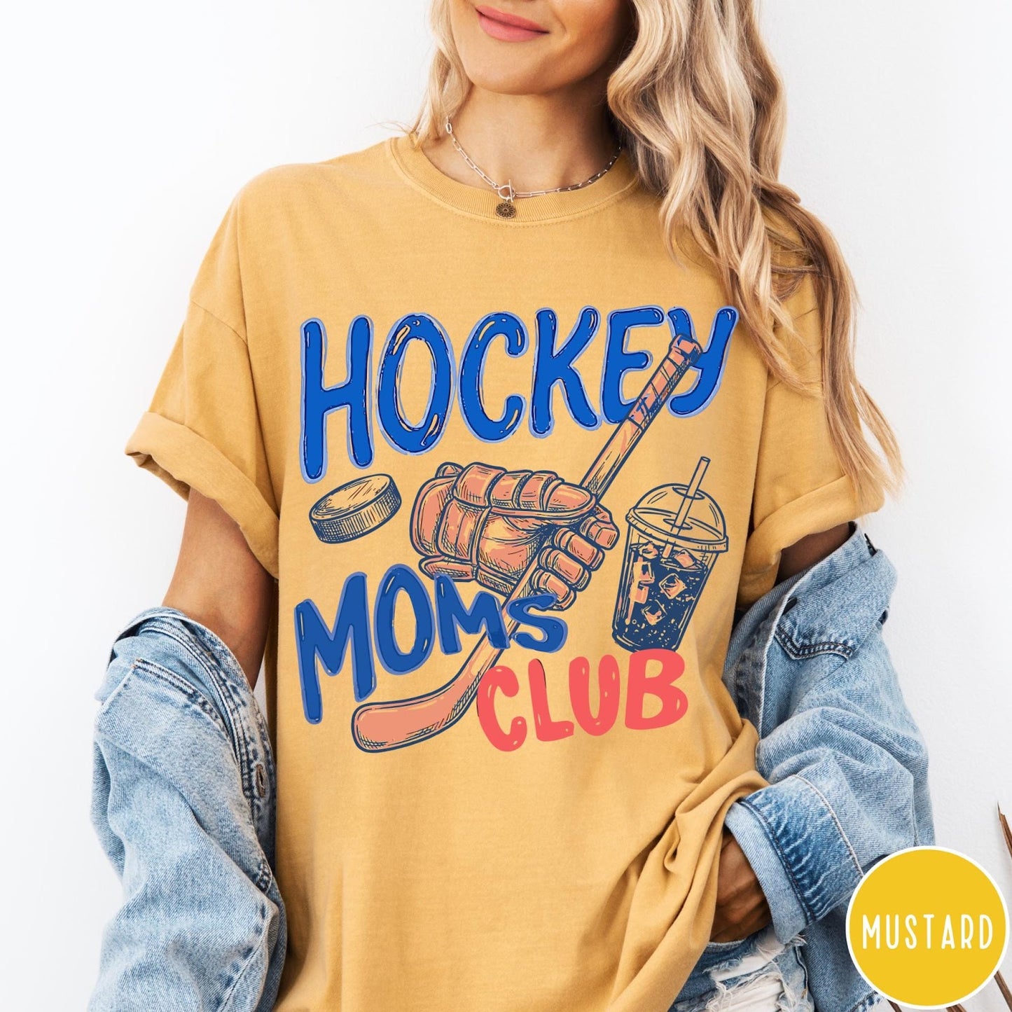 Comfort Colors tee in Mustard featuring lifestyle graphic design with hockey glove, stick, puck, and iced coffee