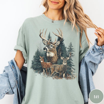 Comfort Colors tee in Bay featuring vintage style graphic of a deer family in a forest scene