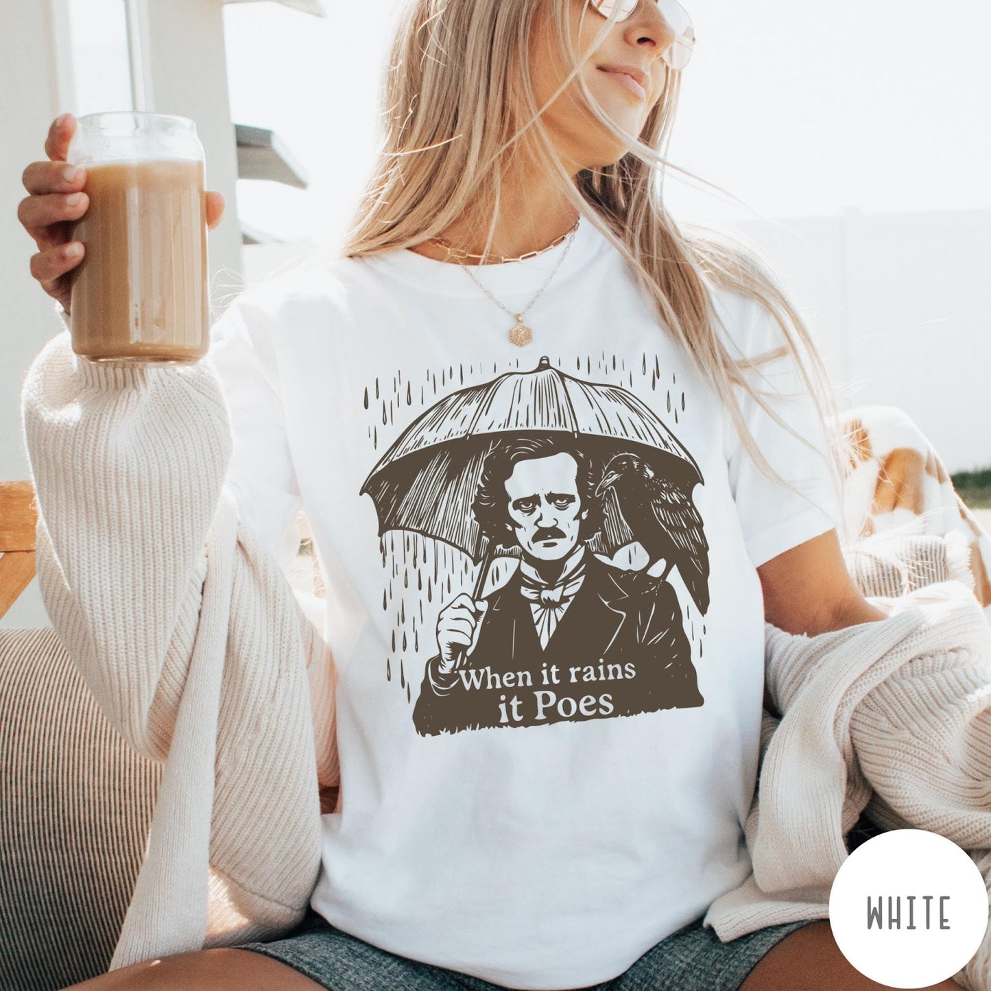 Comfort Colors tee in White featuring graphic illustration of Edgar Allan Poe with umbrella and raven