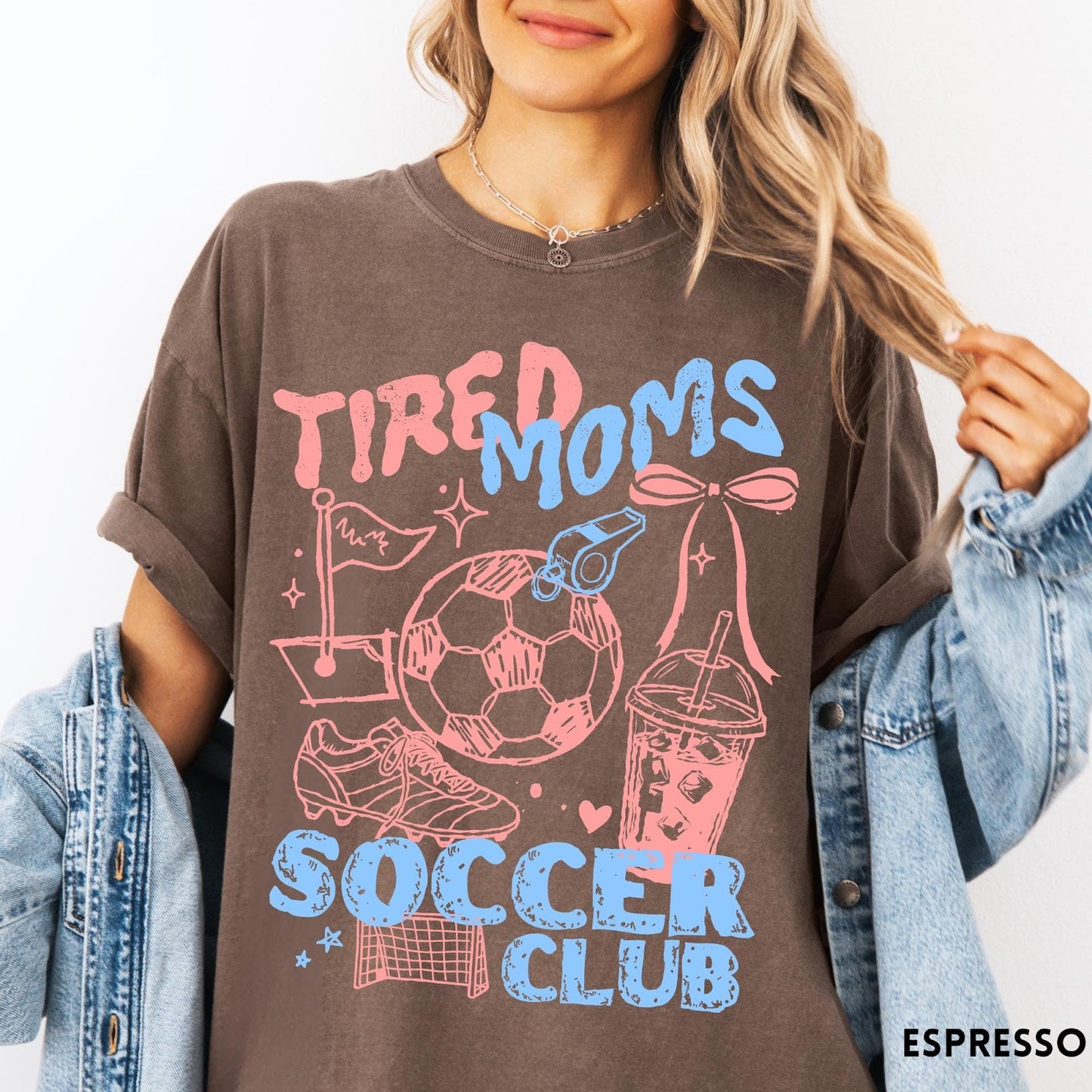 Comfort Colors tee in Espresso featuring soccer mom life graphic with soccer ball, whistle, and iced coffee
