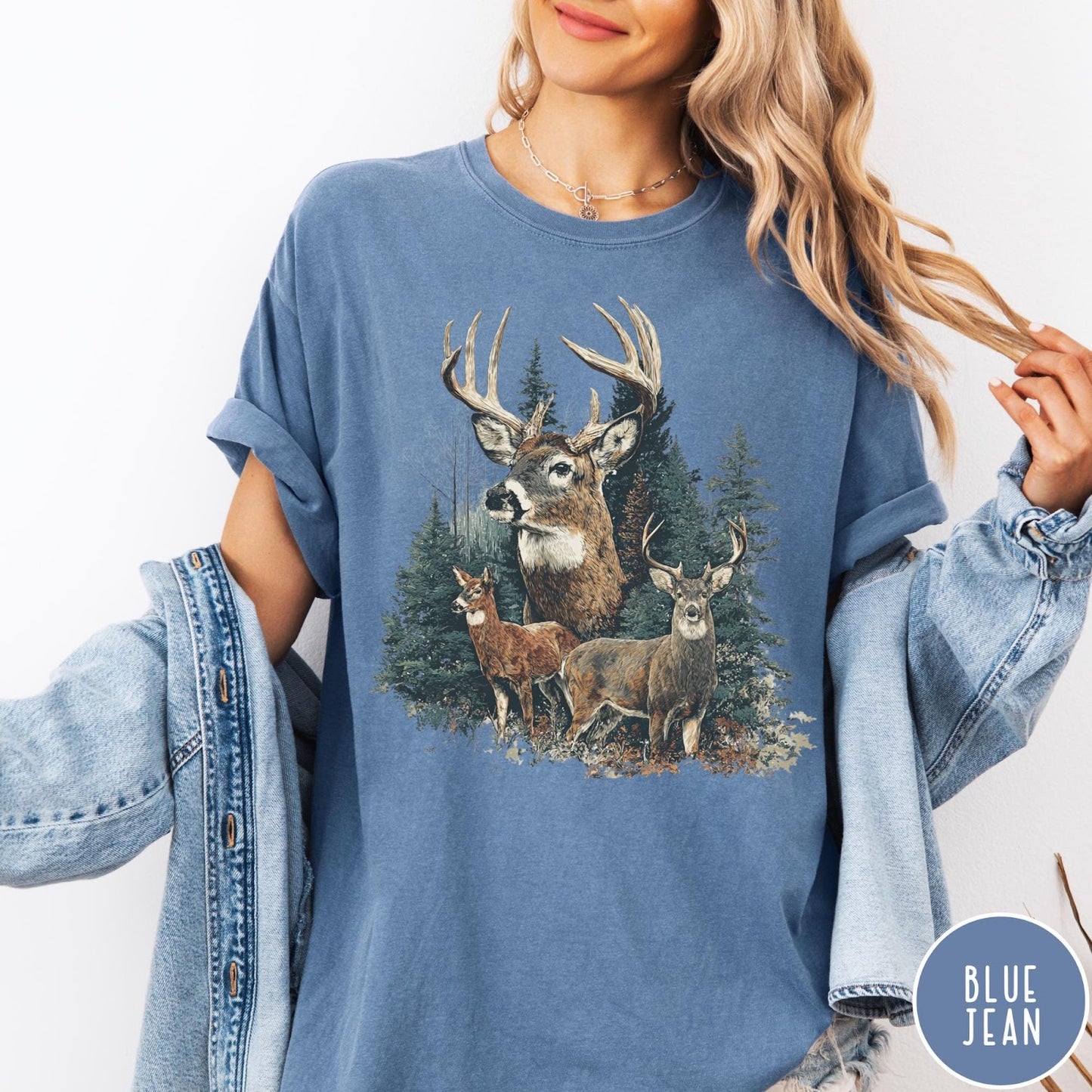Comfort Colors tee in Blue Jean featuring vintage style graphic of deer in a forest