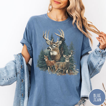 Comfort Colors tee in Blue Jean featuring vintage style graphic of deer in a forest