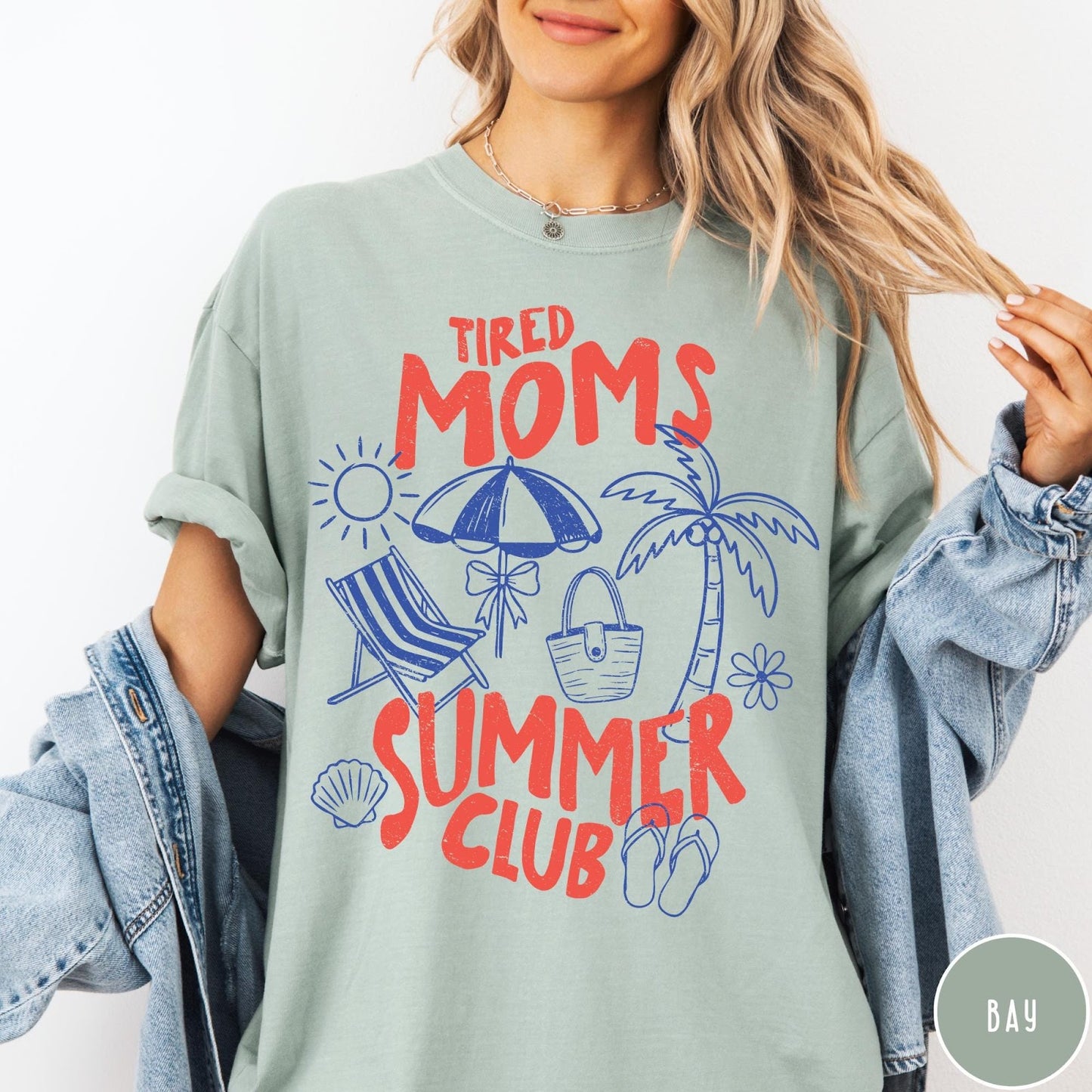 Comfort Colors tee in Bay featuring beach vacation graphic with sun, palm tree, umbrella, and summer text