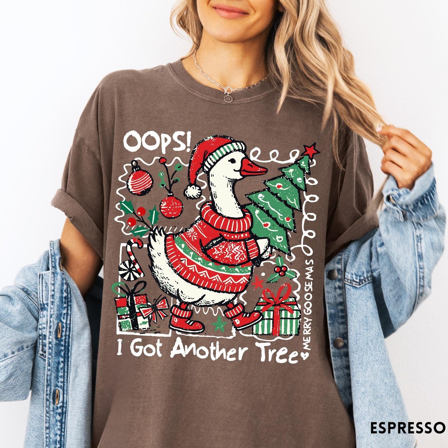 Comfort Colors tee in Espresso featuring festive graphic design of a goose wearing a sweater and hat