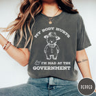 Comfort Colors tee in Pepper featuring line art style bear wearing a hat and button-up shirt graphic