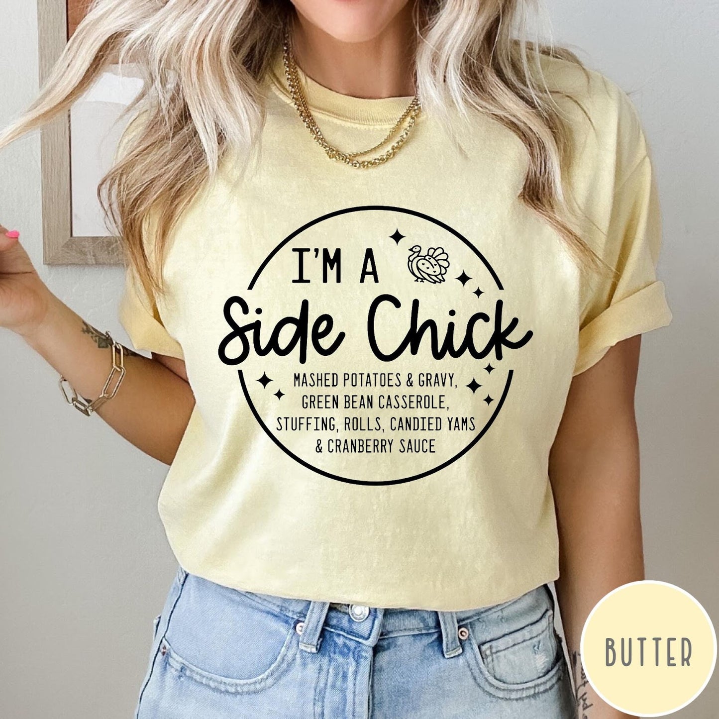Comfort Colors tee in Butter featuring circular Thanksgiving side dish graphic with turkey and food list