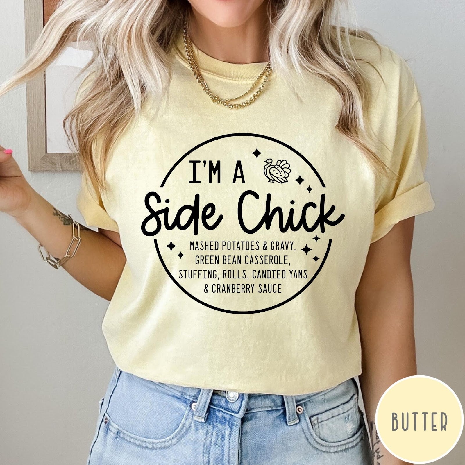 Comfort Colors tee in Butter featuring circular Thanksgiving side dish graphic with turkey and food list