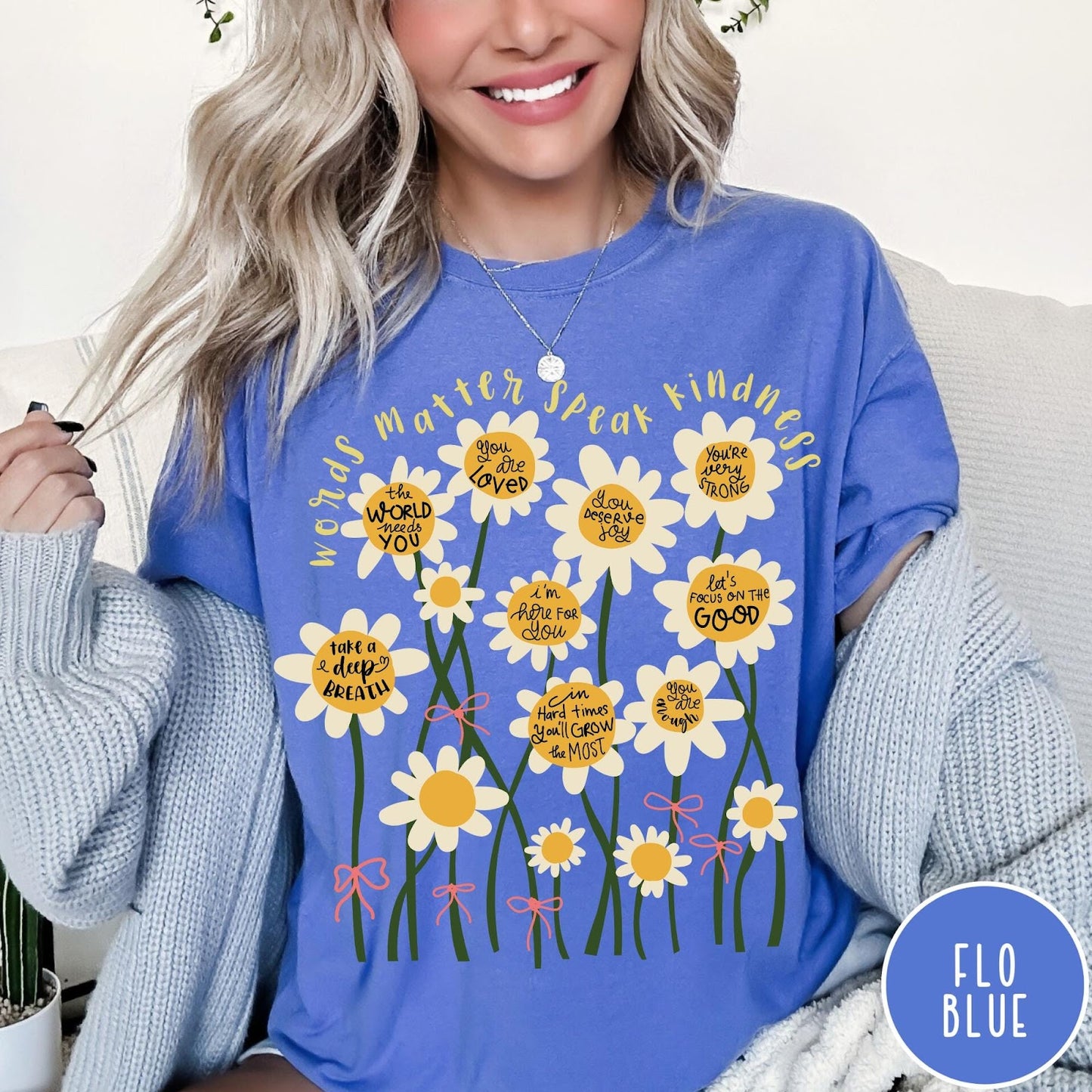 Comfort Colors tee in Flo Blue featuring daisy graphic with positive affirmations and encouraging words about kindness