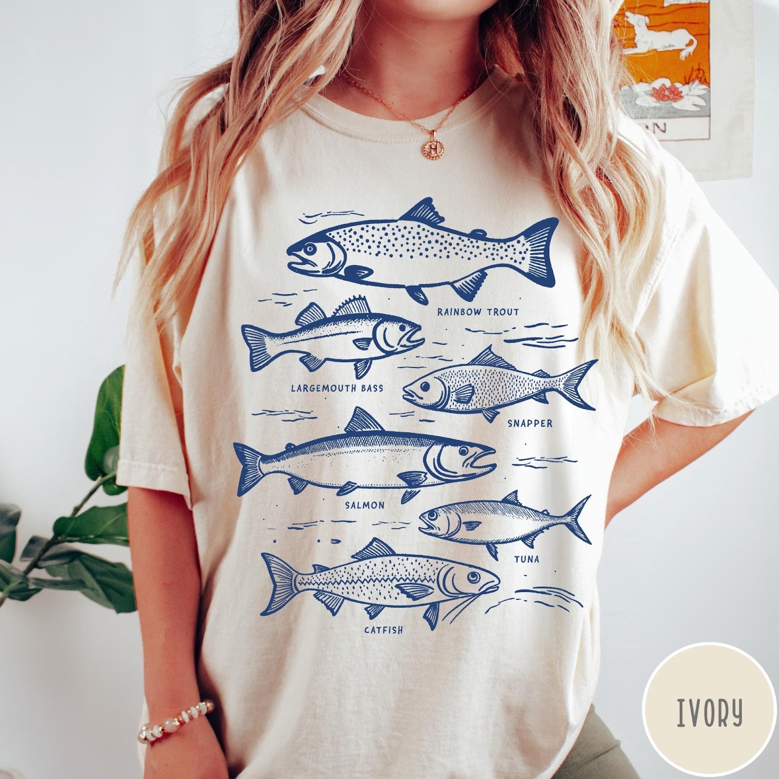Comfort Colors tee in Pepper featuring vintage line illustration of various fish species with their names labeled.