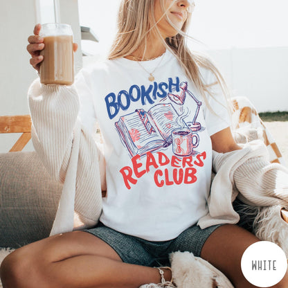 Comfort Colors tee in White featuring bookish reading graphic with open book, lamp, and coffee mug