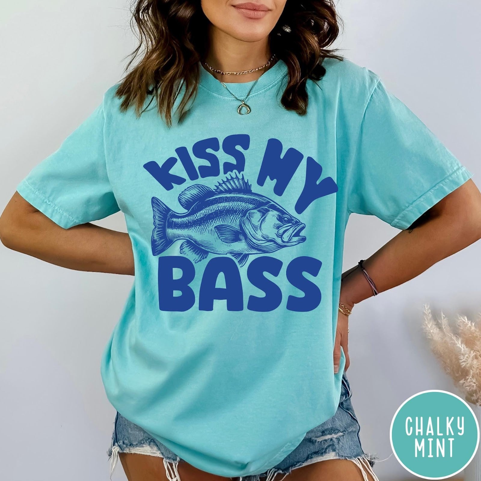 Comfort Colors tee in Chalky Mint featuring retro fishing style graphic with a bass fish and bold text
