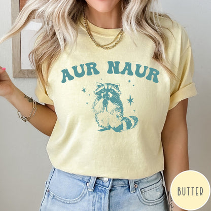 Comfort Colors tee in Butter featuring retro style graphic of a raccoon with stars and text