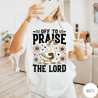 Comfort Colors tee in White featuring screen print style graphic of a goose carrying a book