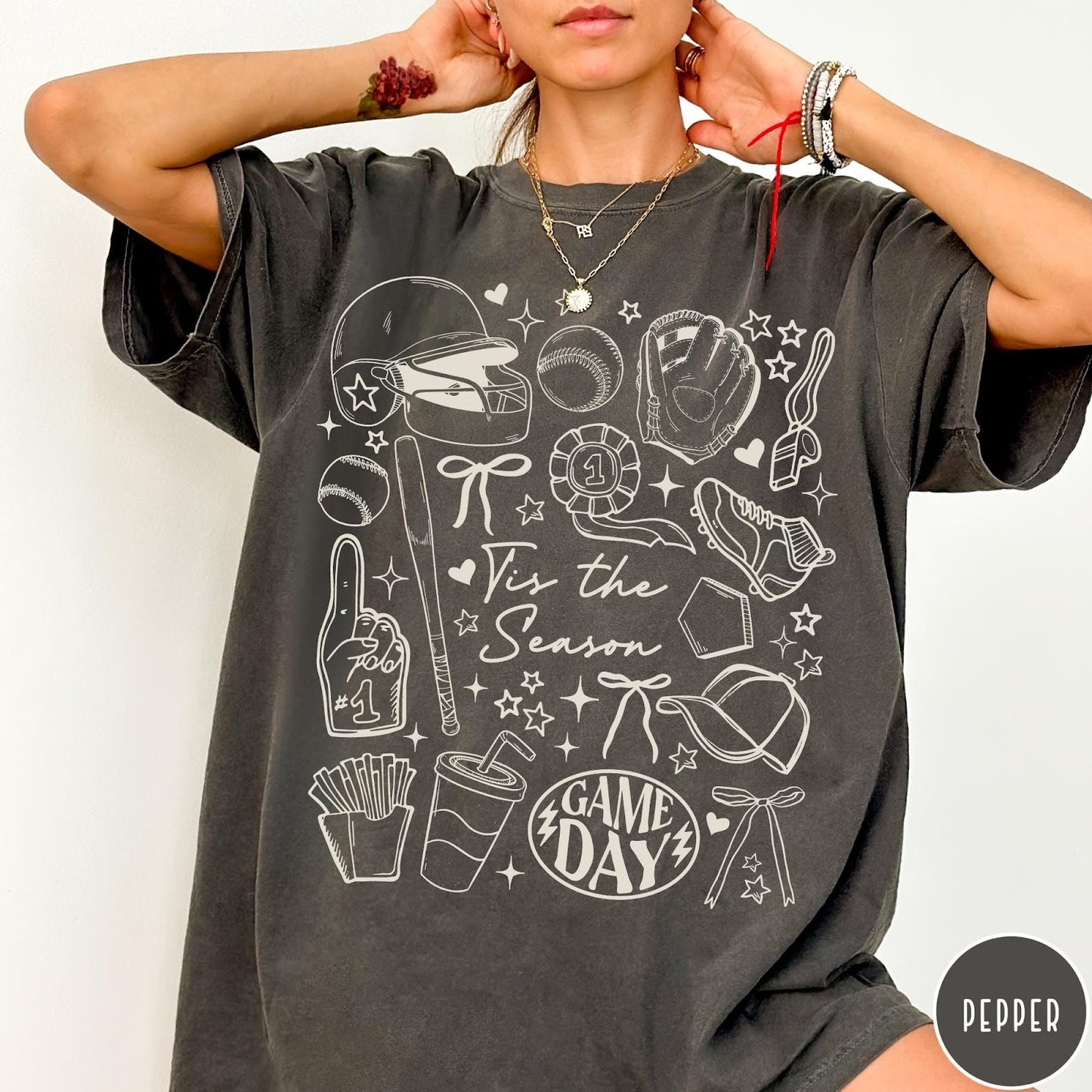 Comfort Colors tee in Pepper featuring baseball game day graphic with bat, helmet, and game day text