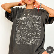 Comfort Colors tee in Pepper featuring baseball game day graphic with bat, helmet, and game day text