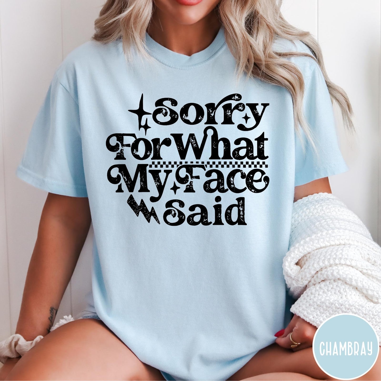 Comfort Colors tee in Chambray featuring sarcastic expression graphic Sorry for What My Face Said in black