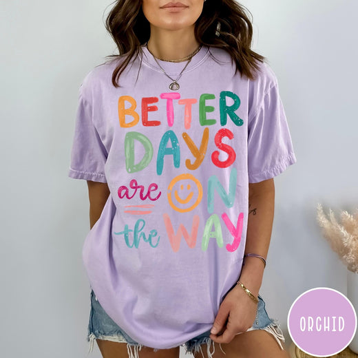 Comfort Colors tee in Orchid featuring optimistic typography with Better Days Are On The Way graphic text