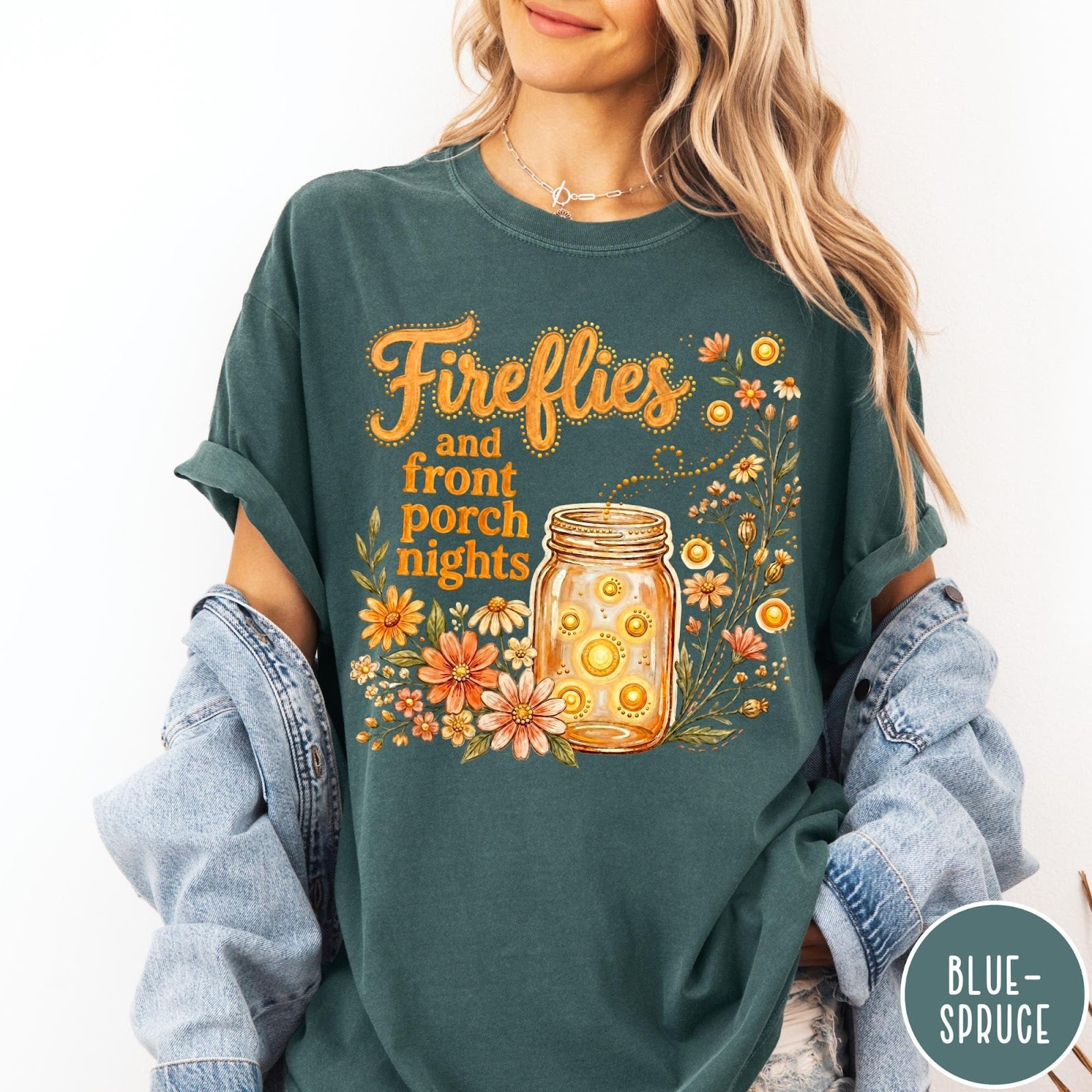 Comfort Colors tee in Blue Spruce featuring rustic style graphic of fireflies in a mason jar with wildflowers