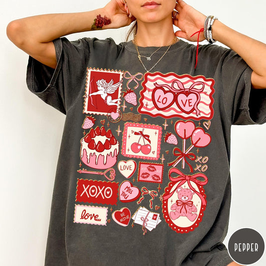 Comfort Colors tee in Pepper featuring vintage collage design with cupid, teddy bear, and Valentine's Day icons