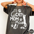 Comfort Colors tee in Pepper featuring vintage style graphic with cats, paw prints, and cat mom club text