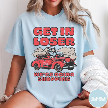 Comfort Colors tee in Chambray featuring retro style graphic of Santa Claus driving a red convertible car