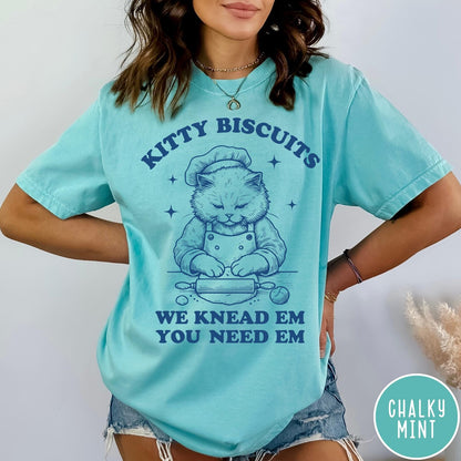 Comfort Colors tee in Chalky Mint featuring cat baking biscuits graphic with chef hat and rolling pin illustration