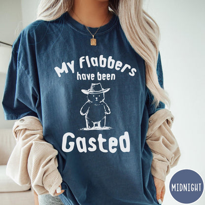 Comfort Colors tee in Midnight featuring illustrated style bear wearing a cowboy hat and text graphic