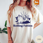 Comfort Colors tee in Ivory featuring illustration style graphic of a chubby cat getting a belly rub
