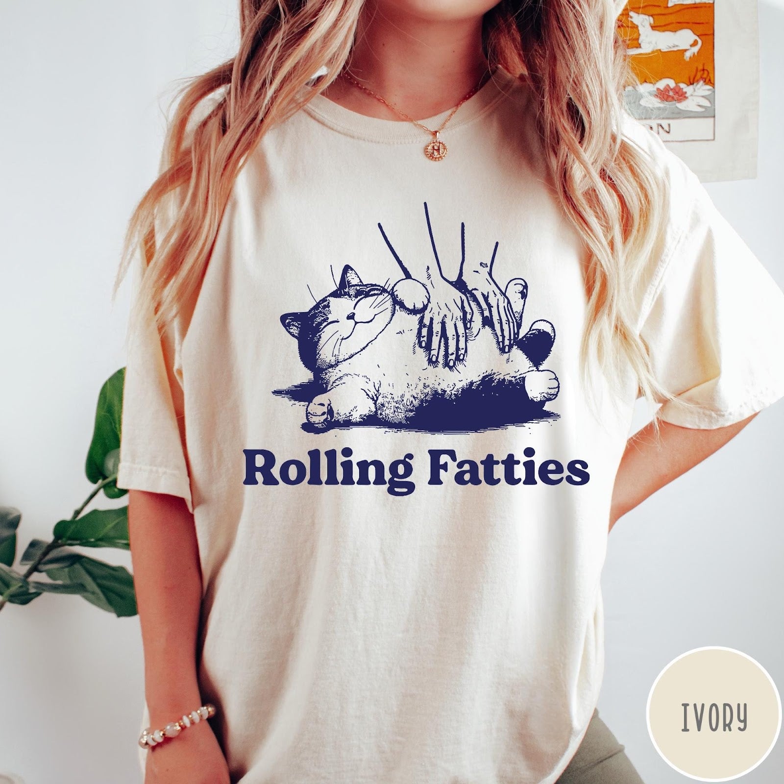 Comfort Colors tee in Ivory featuring illustration style graphic of a chubby cat getting a belly rub