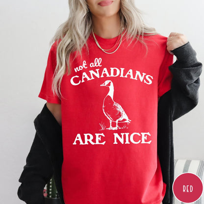Comfort Colors tee in Red featuring casual graphic design of a Canada goose and humorous text